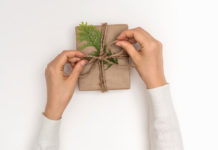 The perfect Christmas present hands wrapping a present